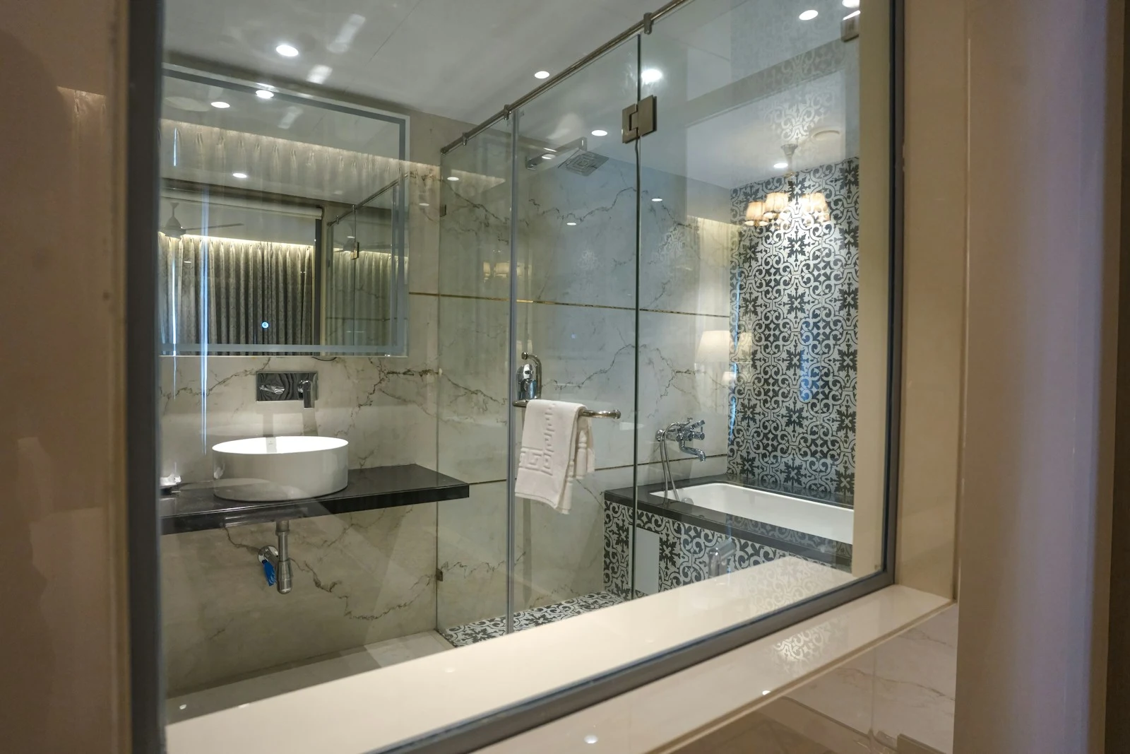 Frameless shower enclosure — illustrative reference photograph